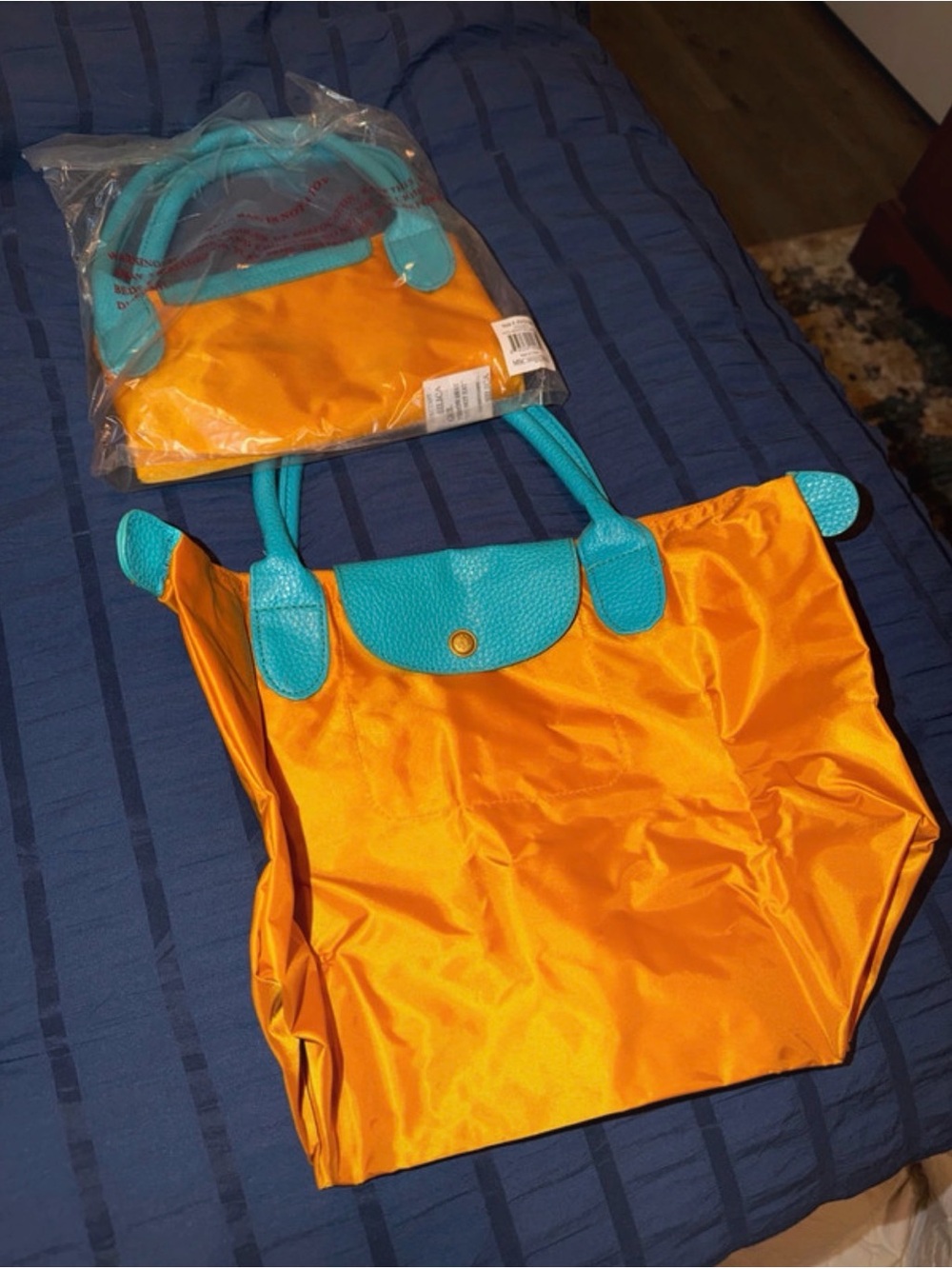 One Piece Gold & Turquoise Tote Bag by MSC